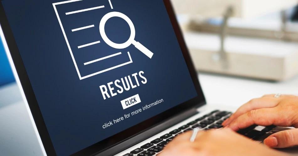 Student checking JEE Main 2025 Paper 2A and 2B results online on laptop screen with “Results” displayed prominently