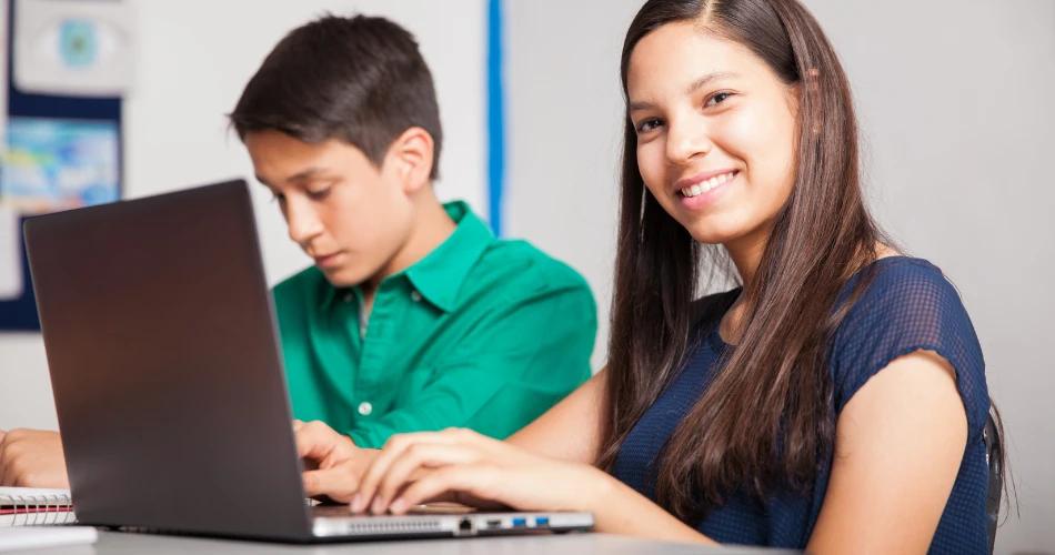 Students eagerly reviewing their CBSE 2025 Class 10 exam results through online portals