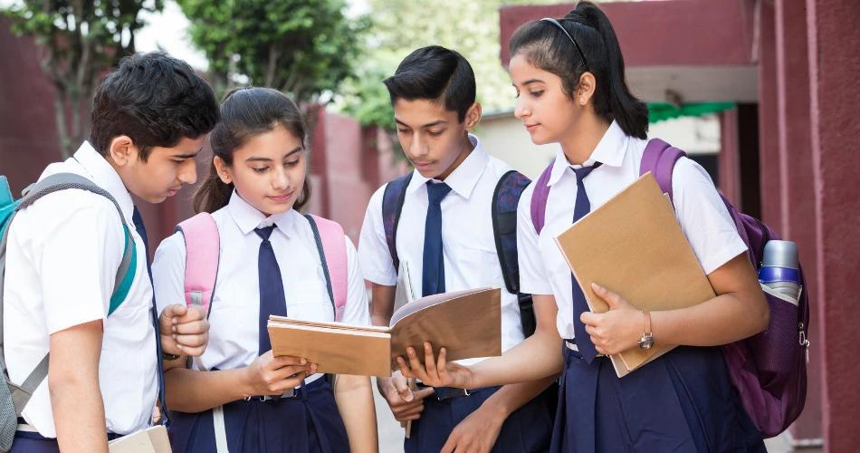 A group of school students in uniforms studying together, symbolizing the bright future of young minds gearing up for the National Automobile Olympiad 2025 organized by CBSE and ASDC.